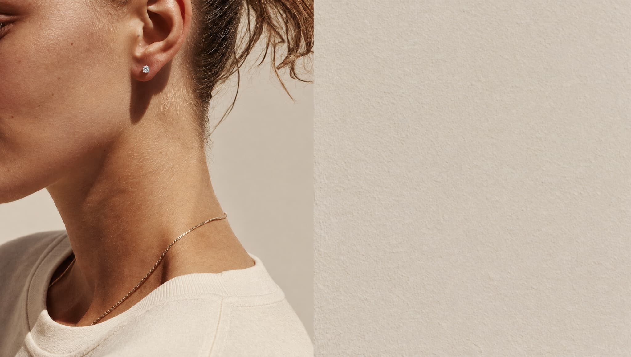Close-up of a JLD moissanite stud earring